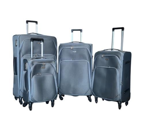 شنط سفر مكونة من اربع قطع مصنوعة من القماش