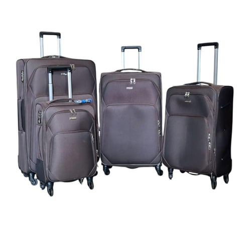 شنط سفر مكونة من اربع قطع مصنوعة من القماش