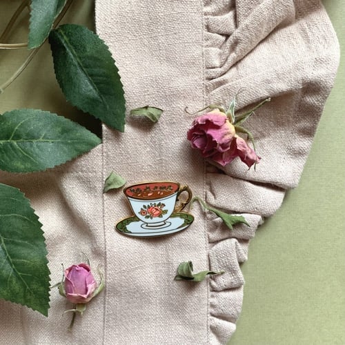 دبوس كوب الشاي