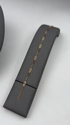 عقد مع سوارة ذهب عيار 18