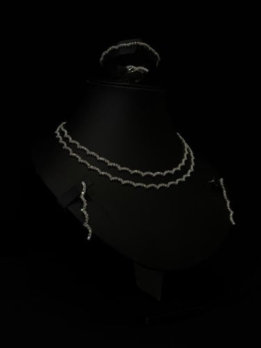 طقم فضي من الكريستال اللامع بتصميم وطواط الجليد