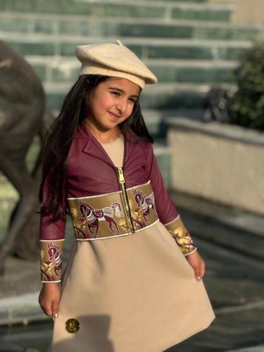 Winter dress and a leather jacket embroidered on luxurious leather