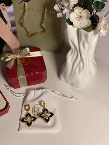 حلق روبيرتو كوين ذهبي