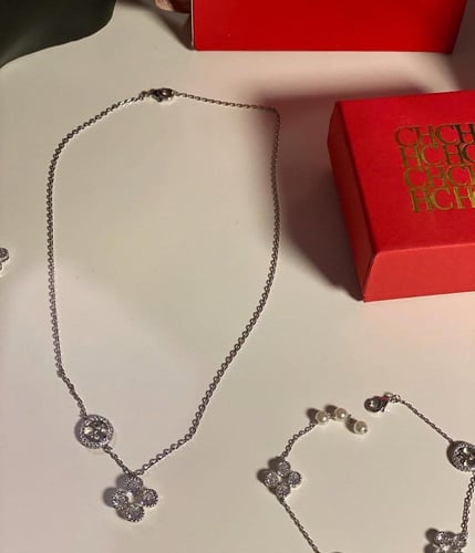 سلسال وحلق واسوارة CH ذهبي