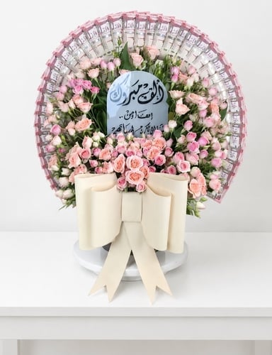 هدية ورد طبيعي بتنسيق مالي