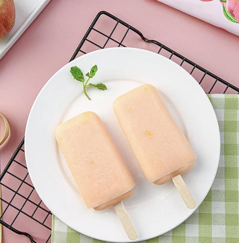 لوتي آيس كريم ريل بقطع الخوخ الكريمي بزمزه 85 جرام