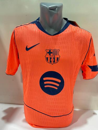 تيشيرت برشلونة الثالث 2024 – لون برتقالي بتصميم ري...