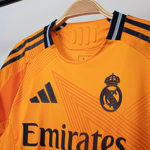 طقم ريال مدريد البرتقالي