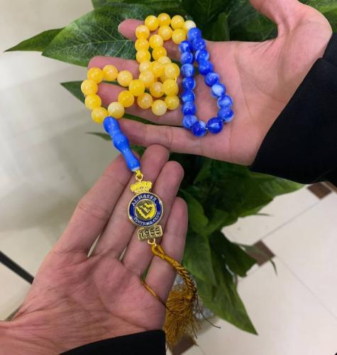 سبحه بهوية فريق النصر السعودي