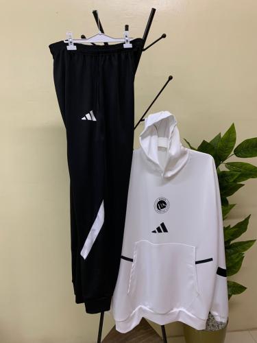 طقم بلوفر النصر الجديد لون أبيض مع بنطلون أسود