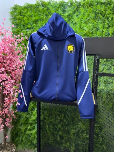 جاكيت نادي النصر رياضي بقبعة – لون كحلي | درة مسك