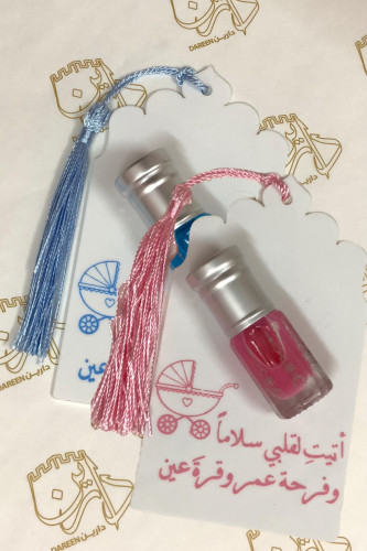 توزيعات مسك مواليد باللون الأزرق والوردي