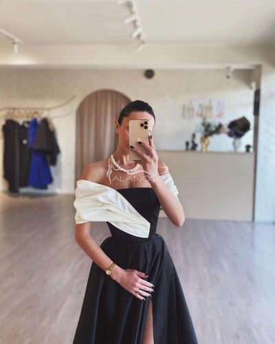 فستان كلاسيكي اسود كلوش طويل