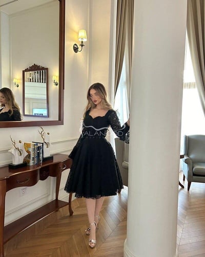 فستان لميس الأسود الأنيق