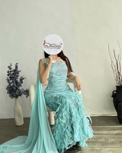 فستان سهره تركواز فخم مزين بالكلفة المتقنة