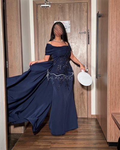 فستان اسوم كحلي سهرة مطرز يدوي بتصميم عصري