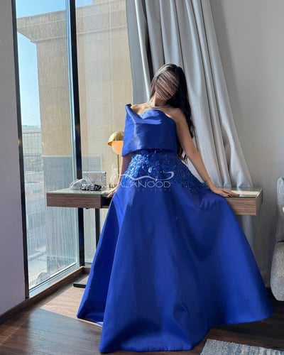 فستان سهرة نيلي بكلفة شك فاخر