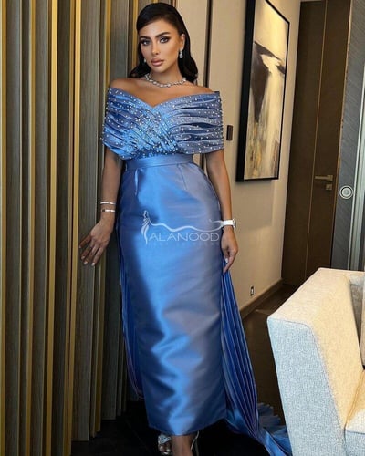 فستان سهرة سماوي بتصميم ملكي