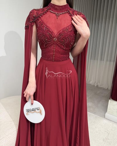 فستان سهرة أحمر غامق أنيق بتصميم فاخر مع أكمام كاب...
