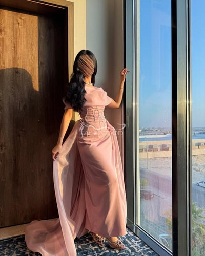 فستان سهرة بخامة اورجانزا وردي أنيق