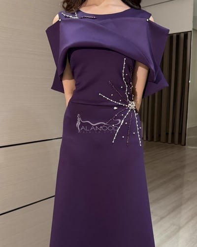 فستان سهرة بنفسجي أنيق بتصميم عصري فخم