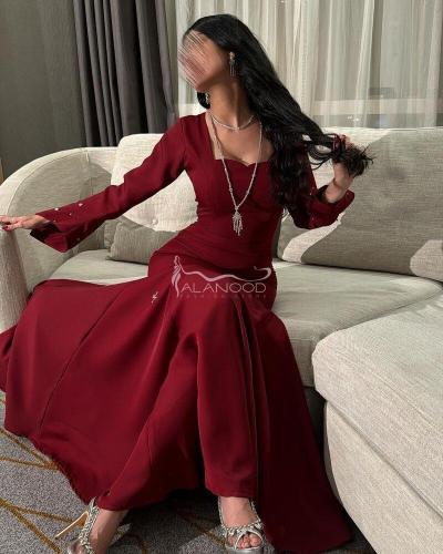 فستان عودي بأكمام مطرزه ساتر انيق