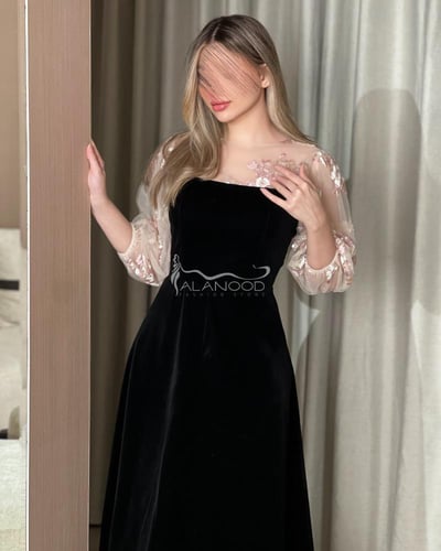 فستان ناعم اسود مميز باكمام بف
