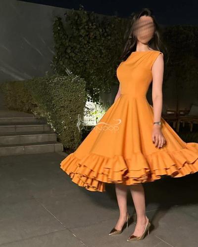 فستان شهد بلون برتقالي ناعم وانيق