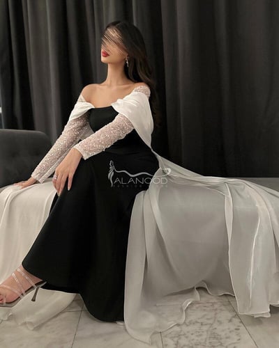 فستان احلام سهره أسود وأبيض باكمام الشك