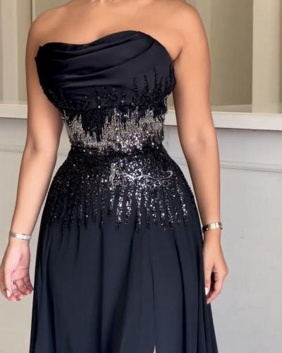 فستان اسود طويل مع شك من الخصر