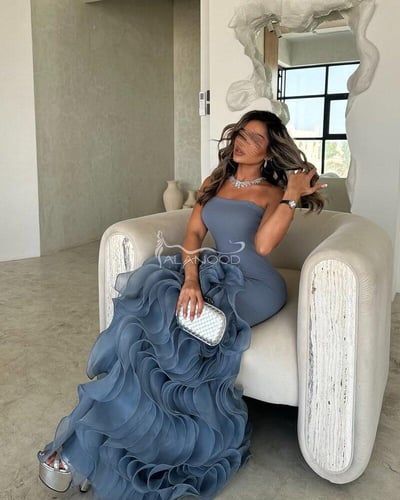 فستان سهرة فخم بلون لافا بتفاصيل أنثوية رائعة