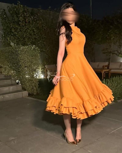 فستان شهد بلون برتقالي ناعم وانيق