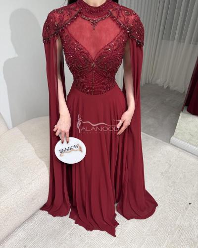 فستان سهرة أحمر غامق أنيق بتصميم فاخر مع أكمام كاب...
