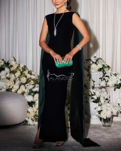 فستان مناسبات اسود مطرز بلون أخضر أنيق