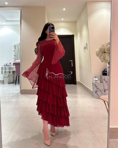 فستان ناعم بلون عنابي اكمام واسعه بكلفة راقية