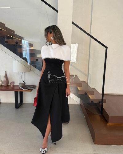 فستان لمياء بلون الأبيض و الأسود الأنيق