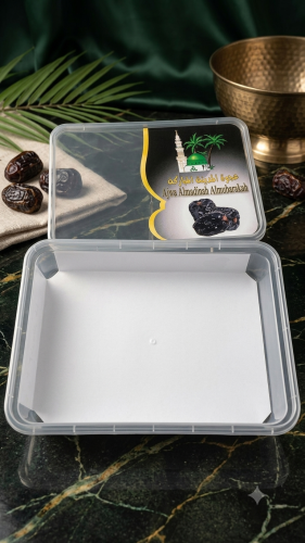 A 1 kg box of Madinah Ajwa dates, suitable for pac...