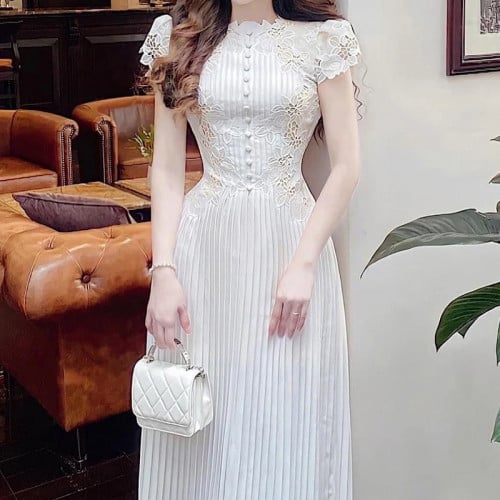 فستان ابيض بكسرات