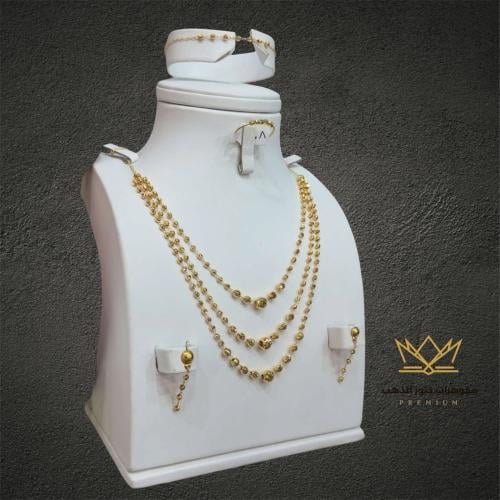 طقم ذهب مميز عيار 21 تصميم كرات الذهب الناعمة