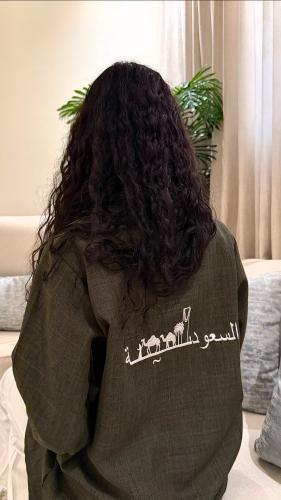 قميص اليوم الوطني زيتي