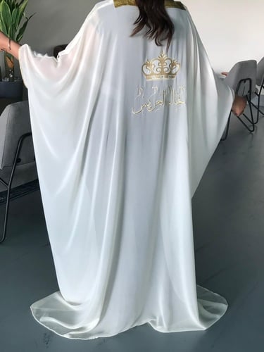 بشت نسائي أبيض تطريز ذهبي