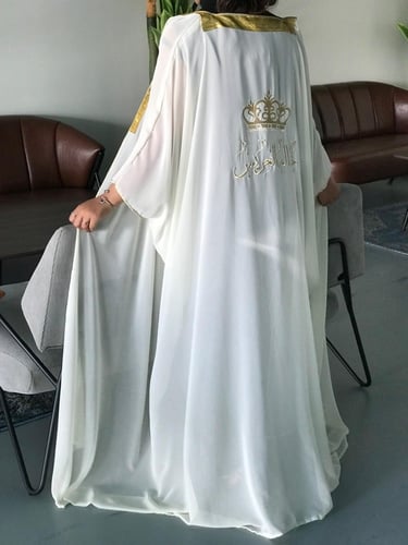 بشت نسائي أبيض تطريز ذهبي