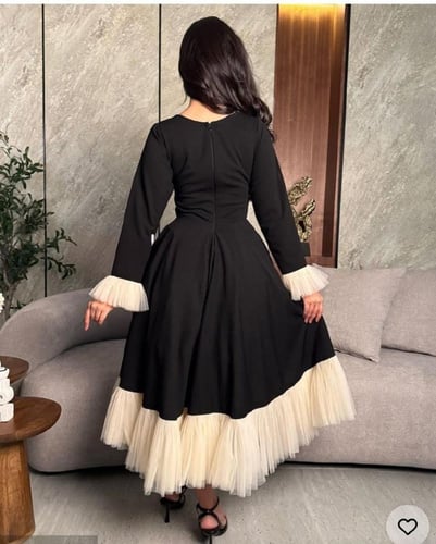 فستان اسود لؤلؤ