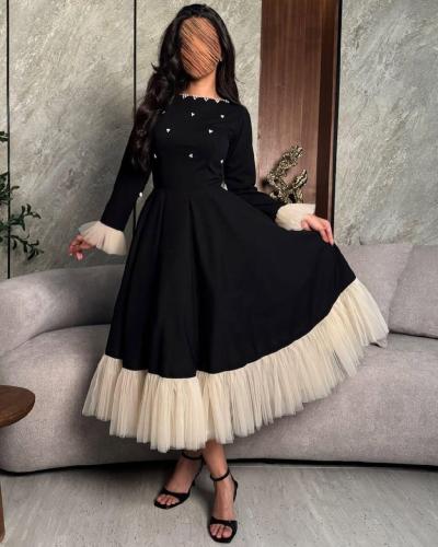 فستان اسود لؤلؤ