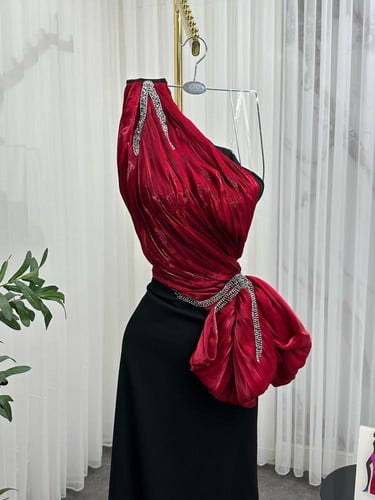 فستان سهرة مطرز عودي