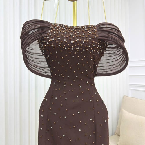 فستان سهرة بني