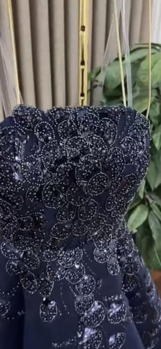 فستان سهر كحلي مطرز خرز