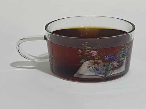 كوب زجاجي مطبوع كتاب