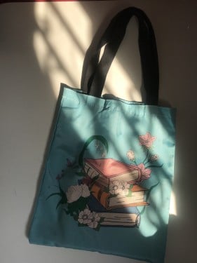 حقيبة توت باق سماوي مطبوع كتب و ورد