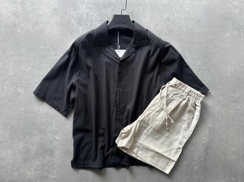 black shirt with biege short